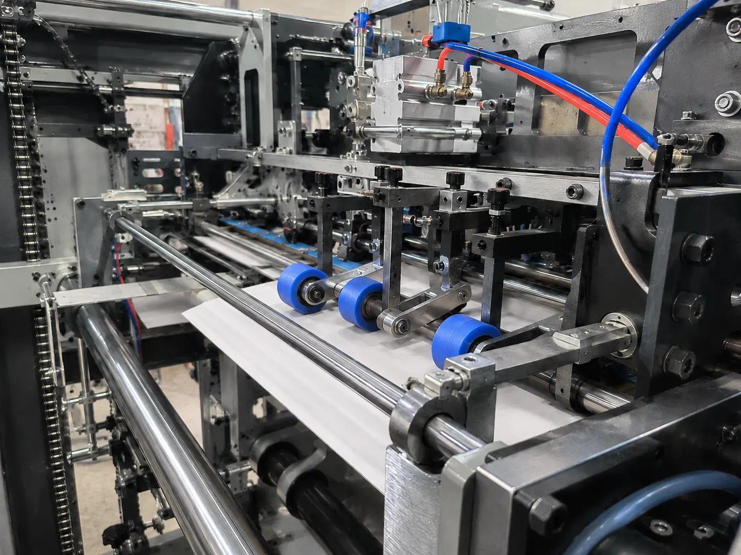 Close-up of the automatic feeder on a die-cutting line